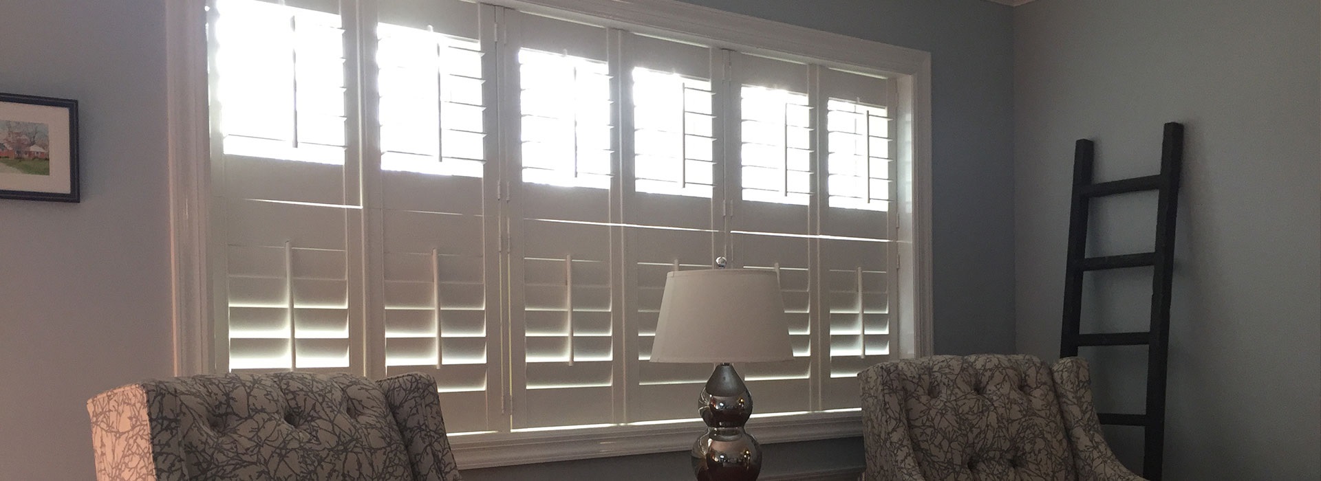 Windows with white blinds