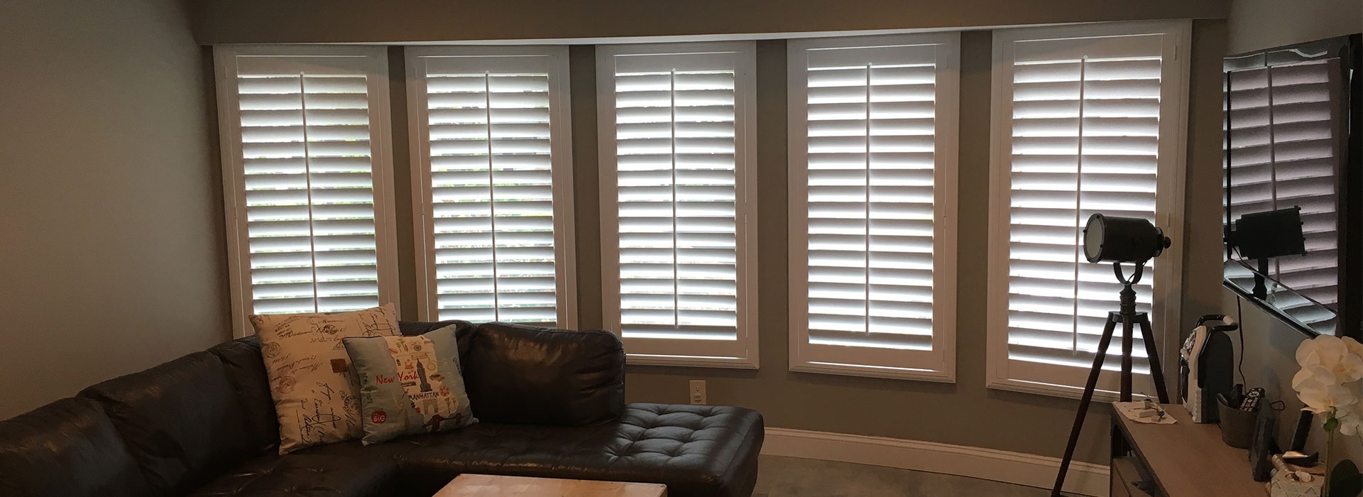 Beautiful custom window treatments with white blinds 