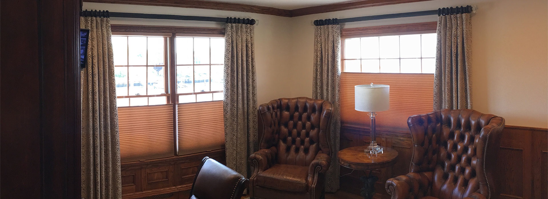 Home interior with light brown drapes